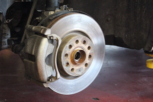 Exposed brake rotor and caliper