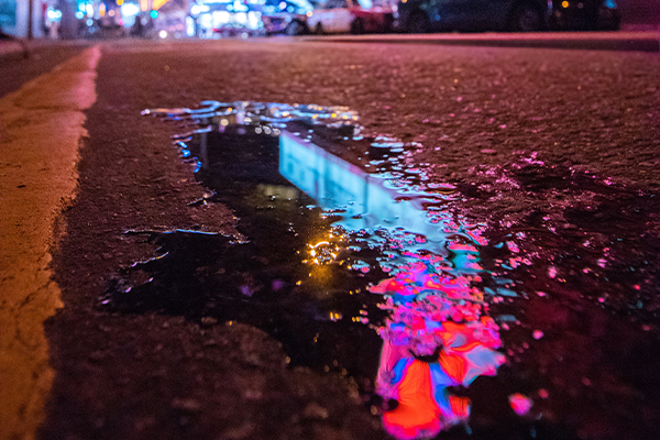 Puddle of oil on road