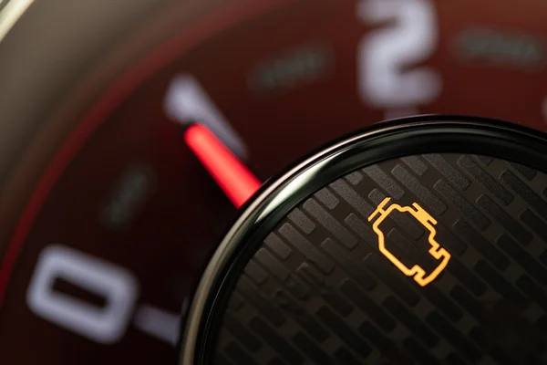 Close up of check engine lights on dashboard of vehicle