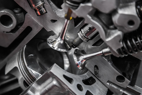 Inside of engine cylinder showing piston and valves