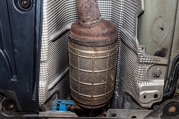 Diesel particulate filter with rust under heatshield of vehicle