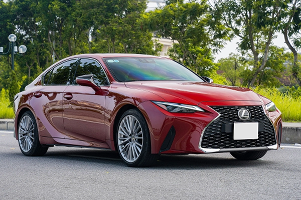 Red Lexus IS sedan parked